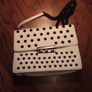 Foly & corinna purse! Never used!!